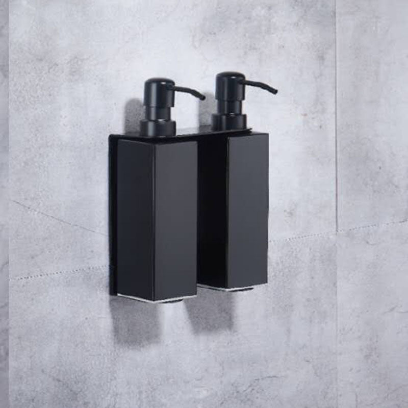 Press the wall-mounted soap dispenser