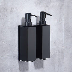 Press the wall-mounted soap dispenser